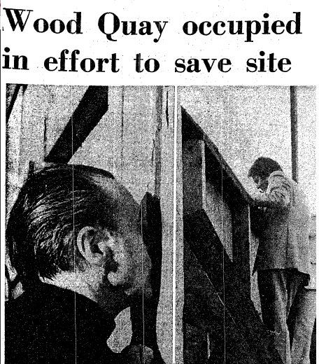 F.X Martin peeps through the fence at Wood Quay. (The Irish Times, 2 June 1979)