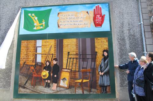 The mural commemorating the evictions. This mural is based on a real newspaper image from the time.