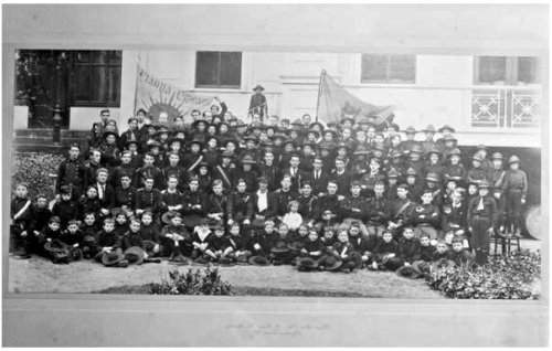 Undated photograph of Fianna Eireann scouts with Countess Markievicz and little girl. Credit - Keogh Photographic Collection, NLI