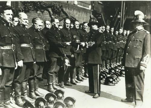 Captain Joe Connolly, Chief Officer Dublin Fire Brigade,presenting the brigade with the new 'electric shockproof' helmets to replace the brass helmet worn since the 1860s. (Thanks to Las Fallon)