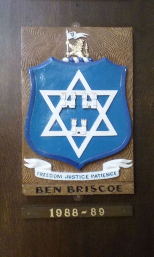 The personal coat of arms of Ben Briscoe, incorporating the Star of David.